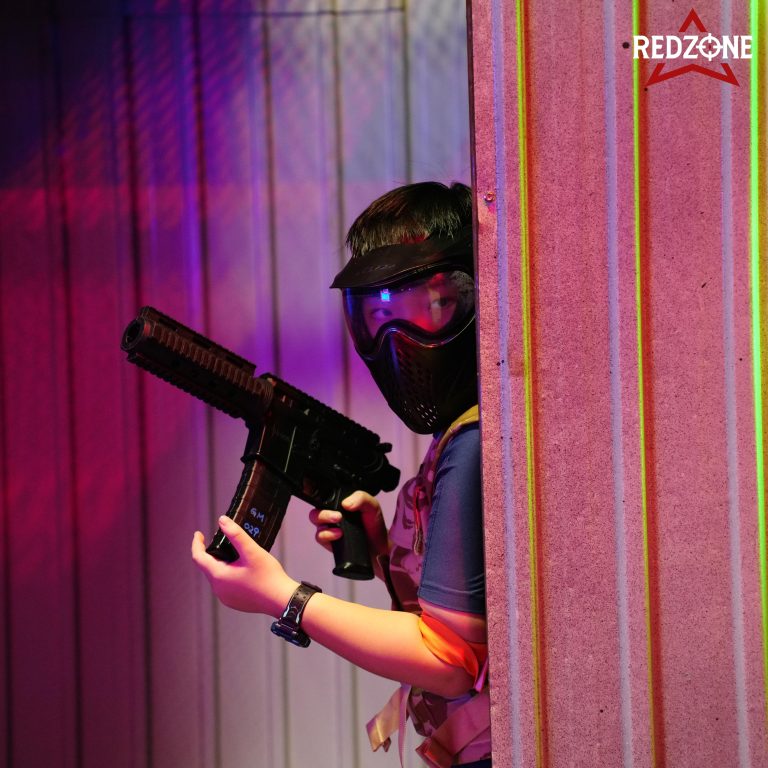 Child playing gel blaster at Red Zone